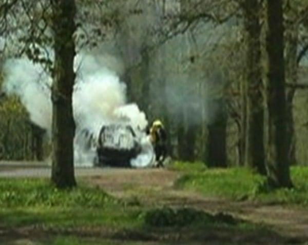 Helen Clements Car on fire in the Lion Enclosure at  Longleat Safari Park