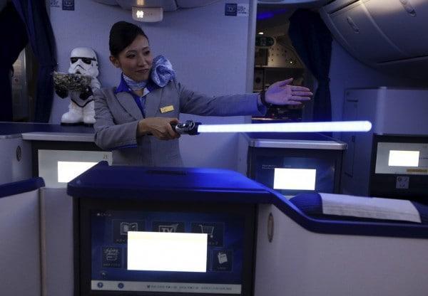 Nippon airlines Star wars R2D2 airplane - stewardess